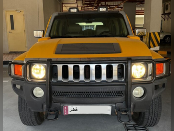 همر  اتش 3  2006  اوتوماتيك  225,000 كم  5 سلندر  دفع رباعي  اس يو في  أصفر