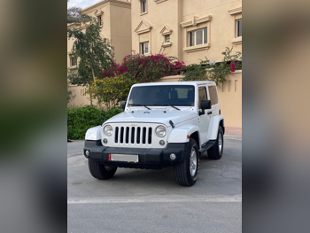 Jeep  Wrangler  Sahara  2015  Automatic  105,000 Km  6 Cylinder  Four Wheel Drive (4WD)  SUV  White