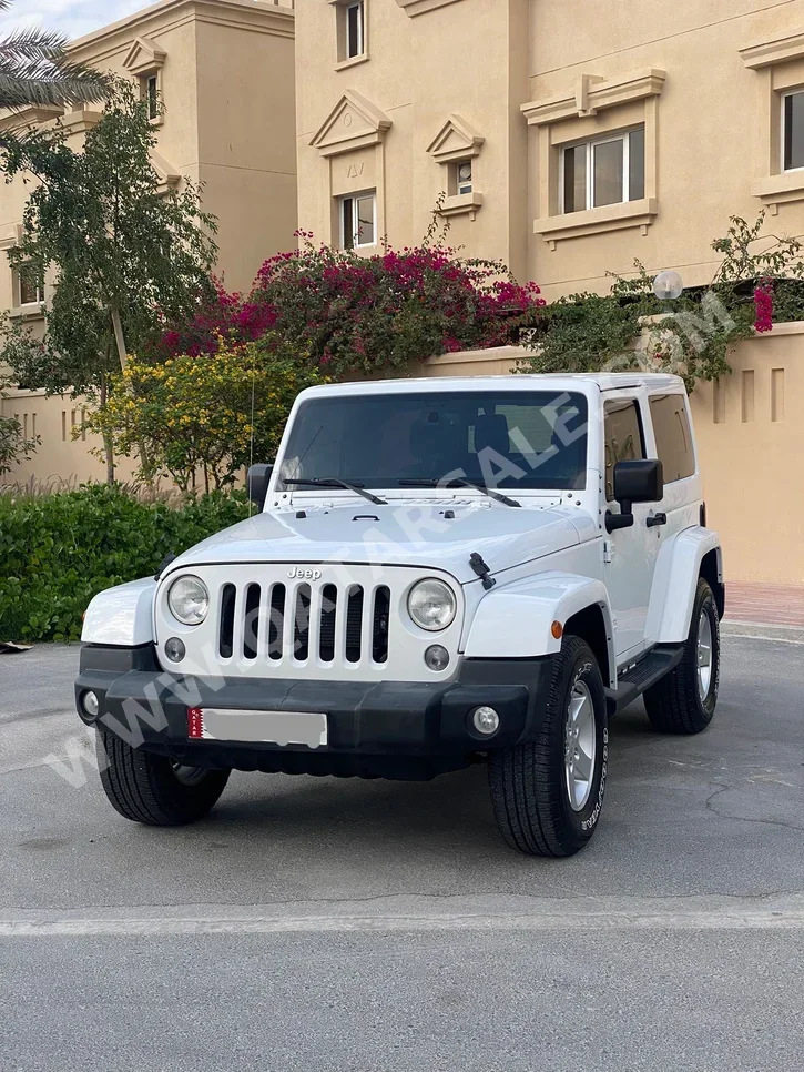 Jeep  Wrangler  Sport  2015  Automatic  105,000 Km  6 Cylinder  Four Wheel Drive (4WD)  SUV  White