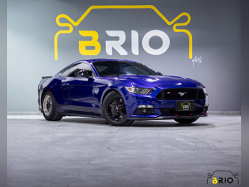 Ford  Mustang  GT Premium  2015  Manual  87,000 Km  8 Cylinder  Rear Wheel Drive (RWD)  Coupe / Sport  Blue