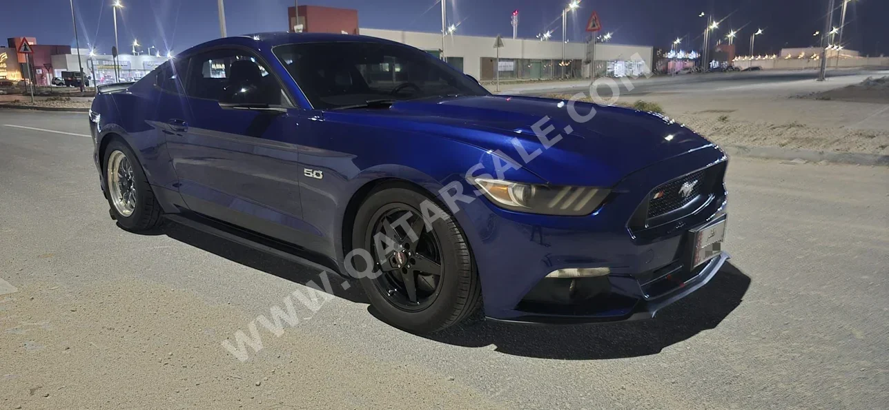 فورد  موستانغ  جي تي  2015  عادي  87,000 كم  8 سلندر  دفع خلفي  كوبيه \ سبورت  ازرق
