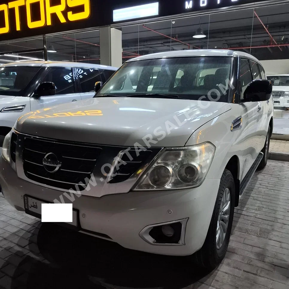 Nissan  Patrol  XE  2017  Automatic  172,000 Km  6 Cylinder  Four Wheel Drive (4WD)  SUV  White