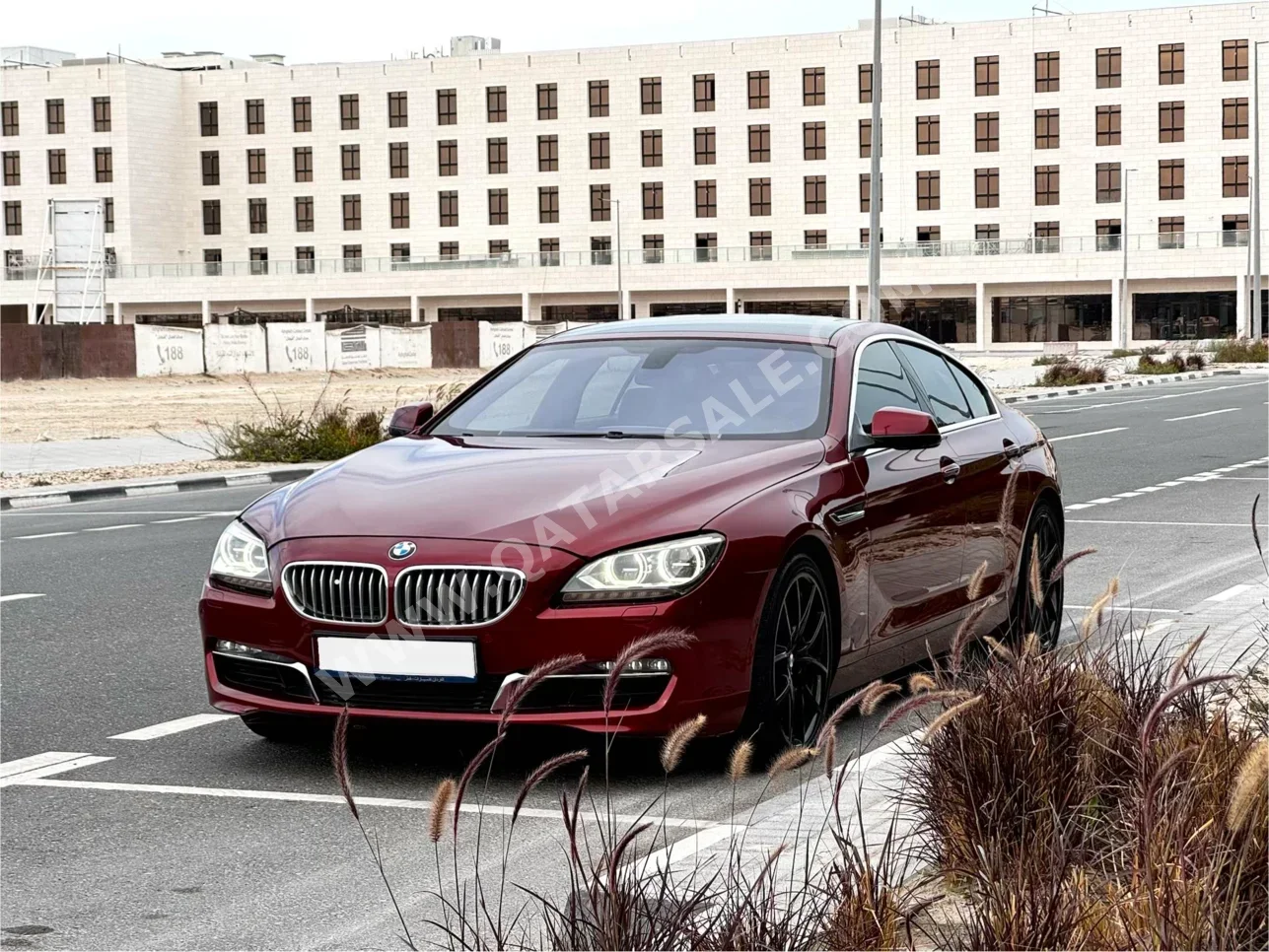 BMW  6-Series  650i  2013  Automatic  139,000 Km  8 Cylinder  Rear Wheel Drive (RWD)  Sedan  Maroon