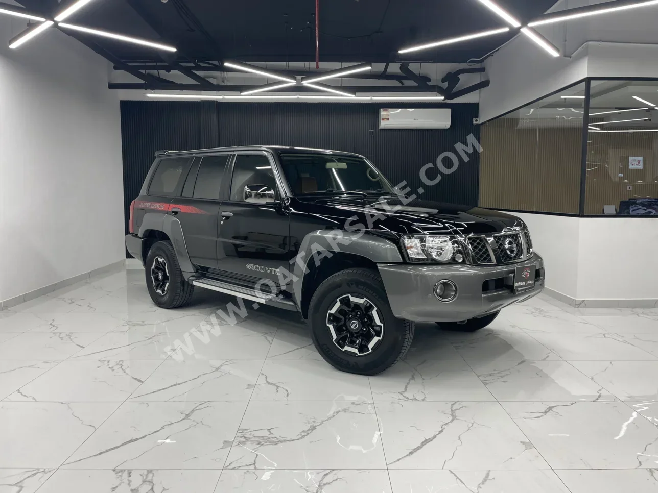 Nissan  Patrol  Super Safari  2022  Automatic  80,000 Km  6 Cylinder  Four Wheel Drive (4WD)  SUV  Black  With Warranty