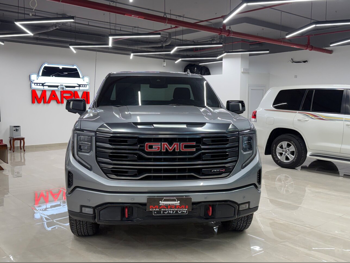 جي ام سي  سييرا  اي تي 4  2023  اوتوماتيك  60,000 كم  8 سلندر  دفع رباعي  بيكب  رمادي