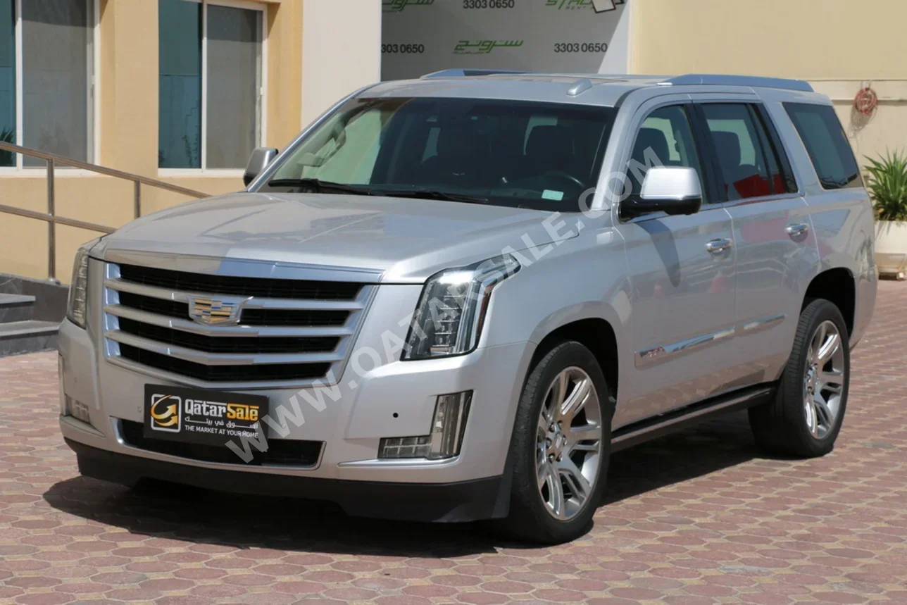 Cadillac  Escalade  Premium  2015  Automatic  210,000 Km  8 Cylinder  Four Wheel Drive (4WD)  SUV  Silver