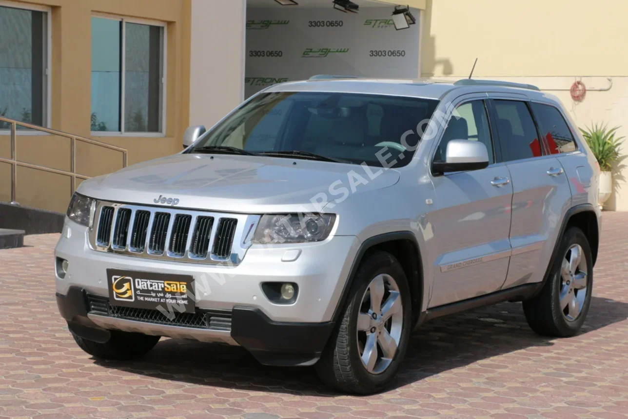 Jeep  Grand Cherokee  Limited  2012  Automatic  147,000 Km  6 Cylinder  Four Wheel Drive (4WD)  SUV  Silver