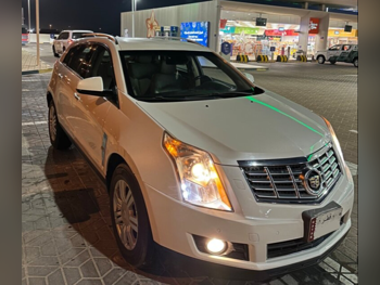 كاديلاك  اس ار اكس  4  2012  اوتوماتيك  164,000 كم  6 سلندر  دفع رباعي  اس يو في  أبيض