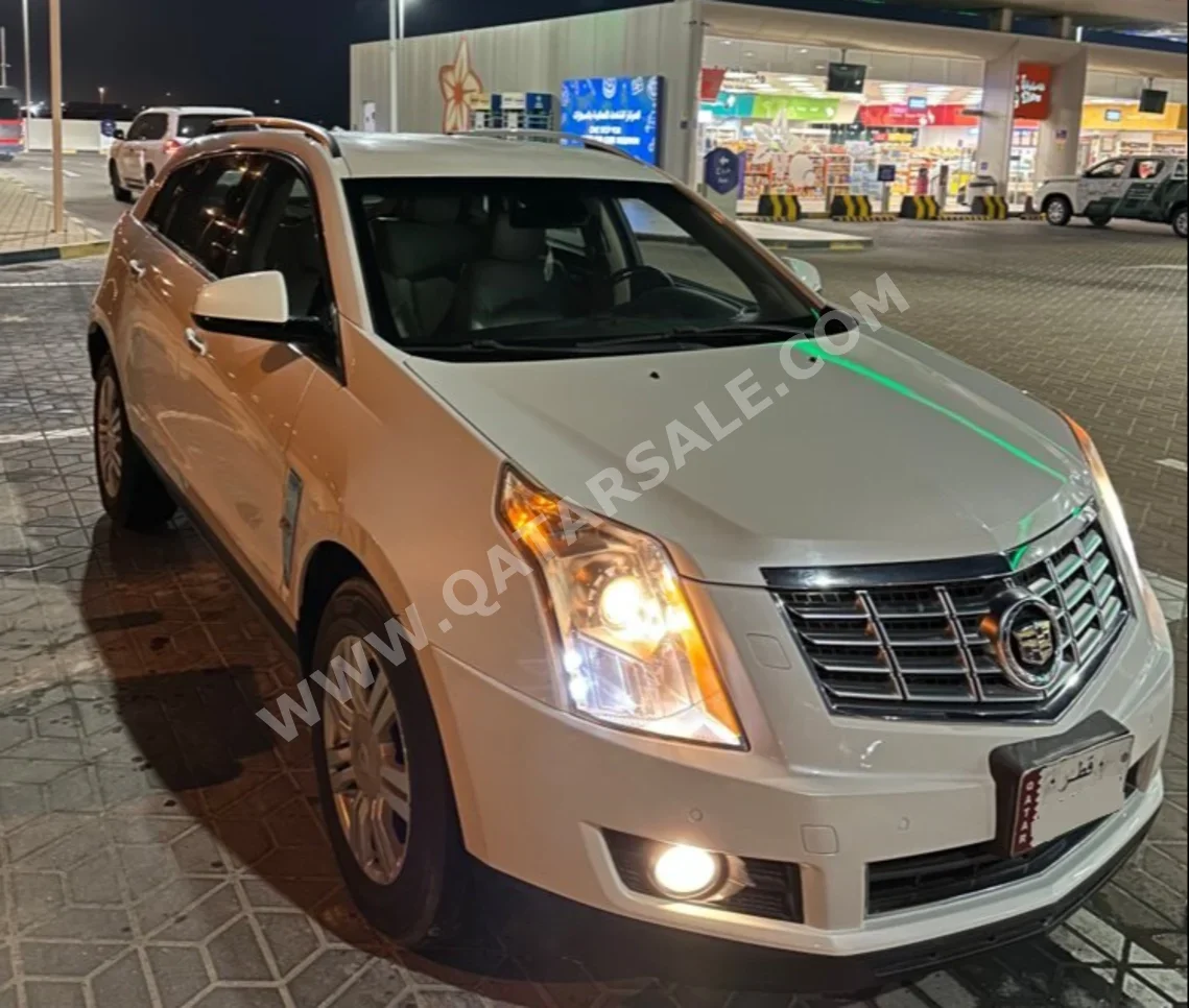 Cadillac  SRX  4  2012  Automatic  164,000 Km  6 Cylinder  Four Wheel Drive (4WD)  SUV  White