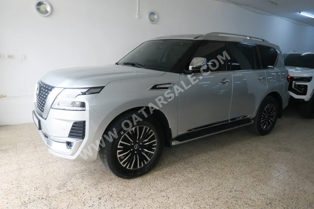 Nissan  Patrol  Platinum  2024  Automatic  13,000 Km  8 Cylinder  Four Wheel Drive (4WD)  SUV  Silver  With Warranty