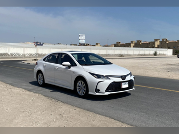 Toyota  Corolla  Hybrid  2025  Automatic  0 Km  4 Cylinder  Front Wheel Drive (FWD)  Sedan  White  With Warranty