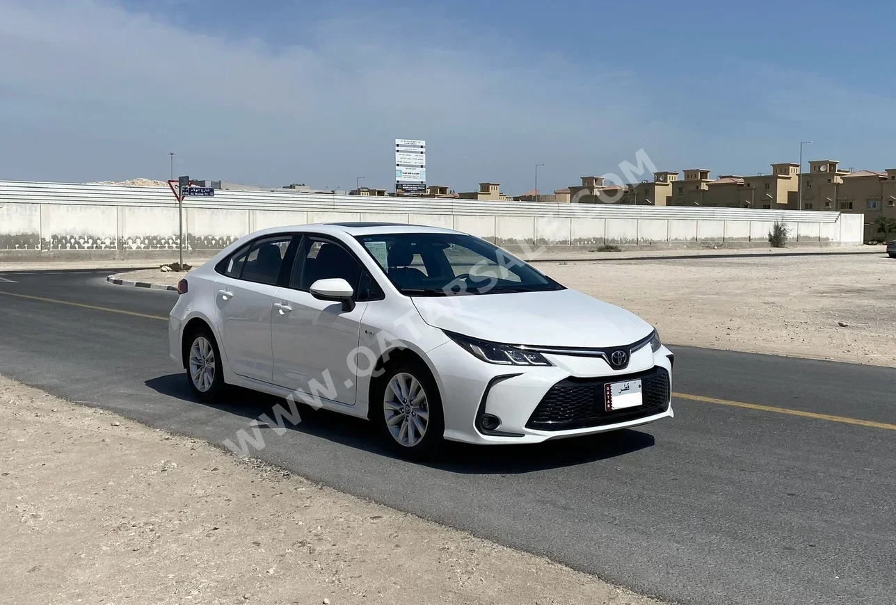 Toyota  Corolla  Hybrid  2025  Automatic  0 Km  4 Cylinder  Front Wheel Drive (FWD)  Sedan  White  With Warranty