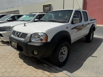 Nissan  Pickup  2006  Manual  400,000 Km  4 Cylinder  Rear Wheel Drive (RWD)  Pick Up  White