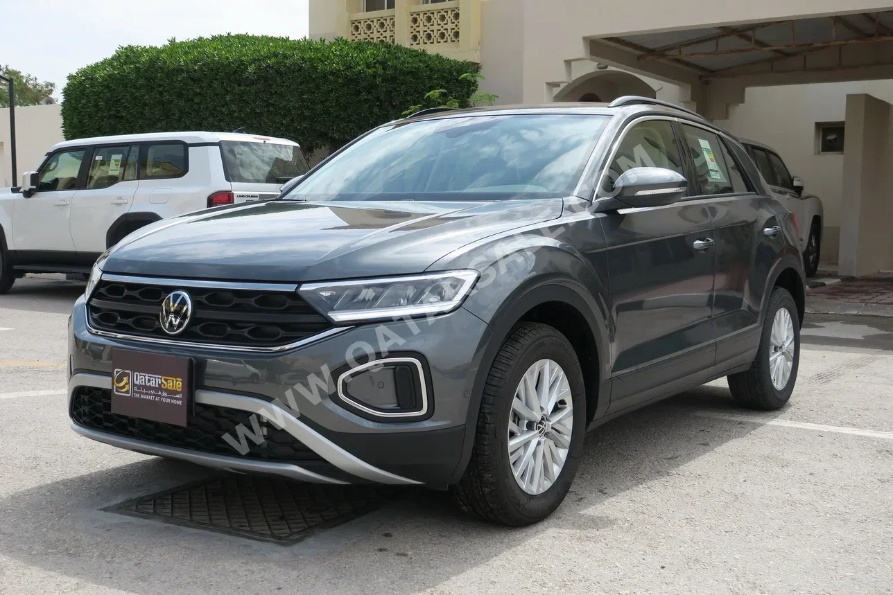 فوكس واغن  تي- روك  2025  اوتوماتيك  300 كم  4 سلندر  سحب امامي  اس يو في  رمادي  تحت الضمان