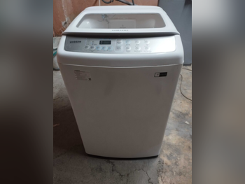 مجموعات الغسالات والمجففات سامسونج \  7 كغ  أبيض  غسالة بالبخار  مع التسليم  مع التركيب  غسالة تحميل علوي  كهرباء