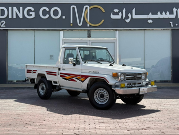 Toyota  Land Cruiser  LX  1997  Manual  150,000 Km  6 Cylinder  Four Wheel Drive (4WD)  Pick Up  White