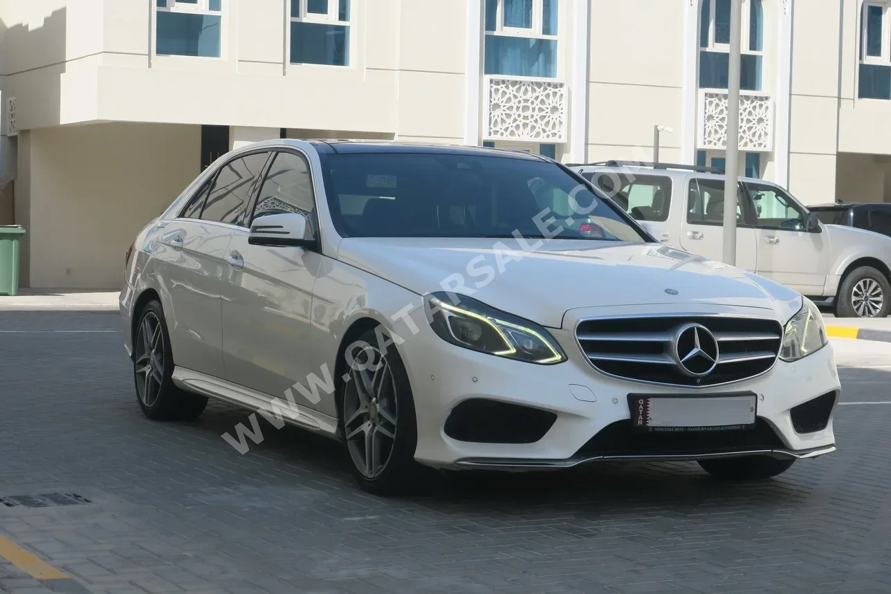 Mercedes-Benz  E-Class  400  2016  Automatic  186,000 Km  6 Cylinder  Rear Wheel Drive (RWD)  Sedan  White