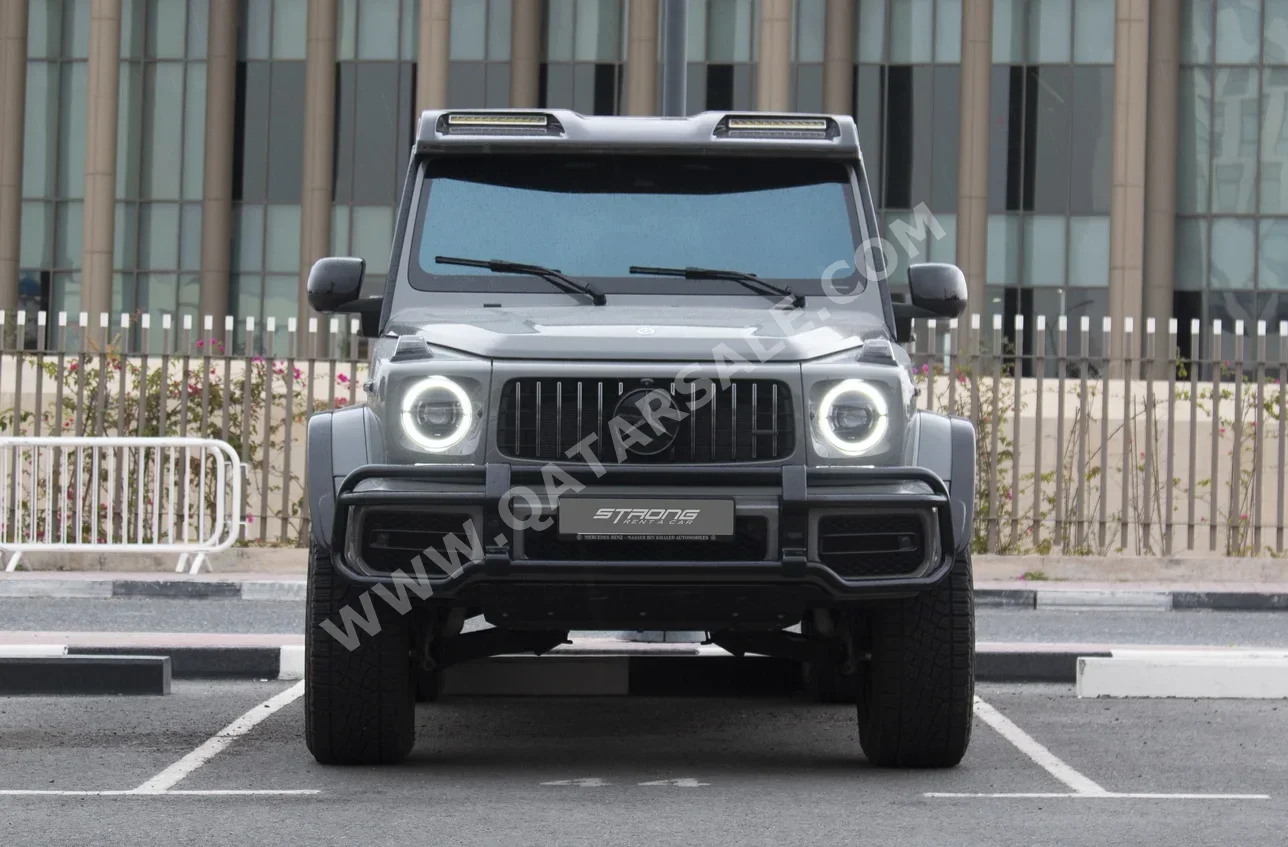 مرسيدس - بنز  جي 63 اي ام جي  8 سلندر  فخمة  رمادي  2023