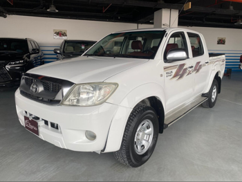 Toyota  Hilux  2009  Manual  390,000 Km  4 Cylinder  Four Wheel Drive (4WD)  Pick Up  White