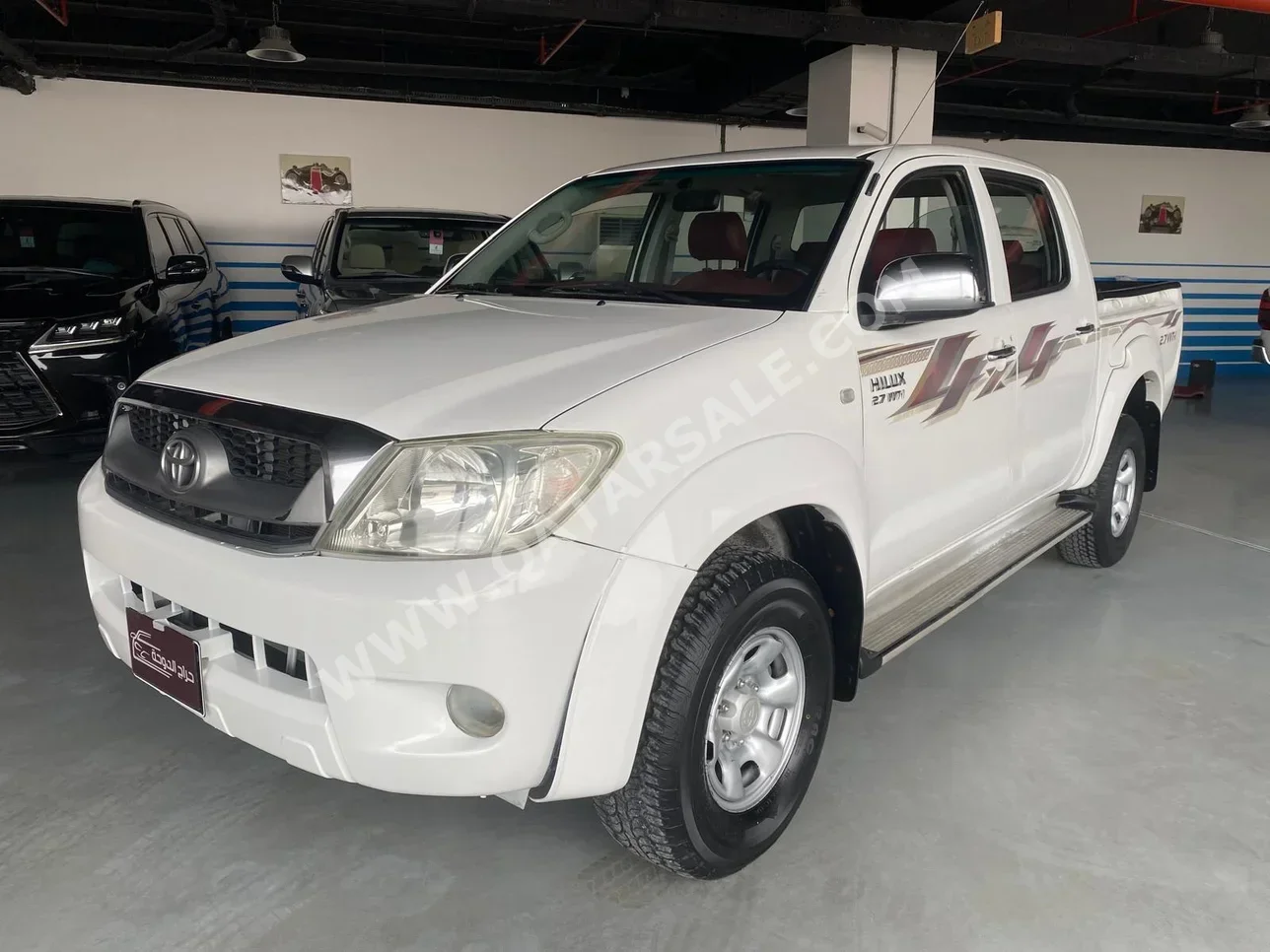 Toyota  Hilux  2009  Manual  390,000 Km  4 Cylinder  Four Wheel Drive (4WD)  Pick Up  White