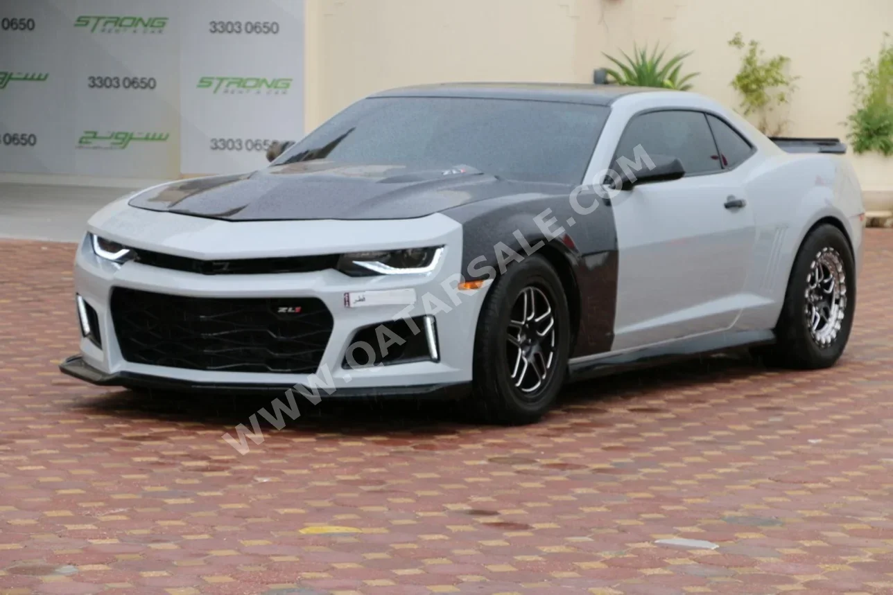 شفروليه  كمارو  زد ال 1  2013  اوتوماتيك  146,000 كم  8 سلندر  دفع خلفي  كوبيه \ سبورت  فضي