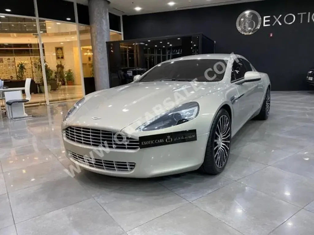  Aston Martin  Rapide  2013  Automatic  35,000 Km  12 Cylinder  All Wheel Drive (AWD)  Sedan  Dark Gray  With Warranty