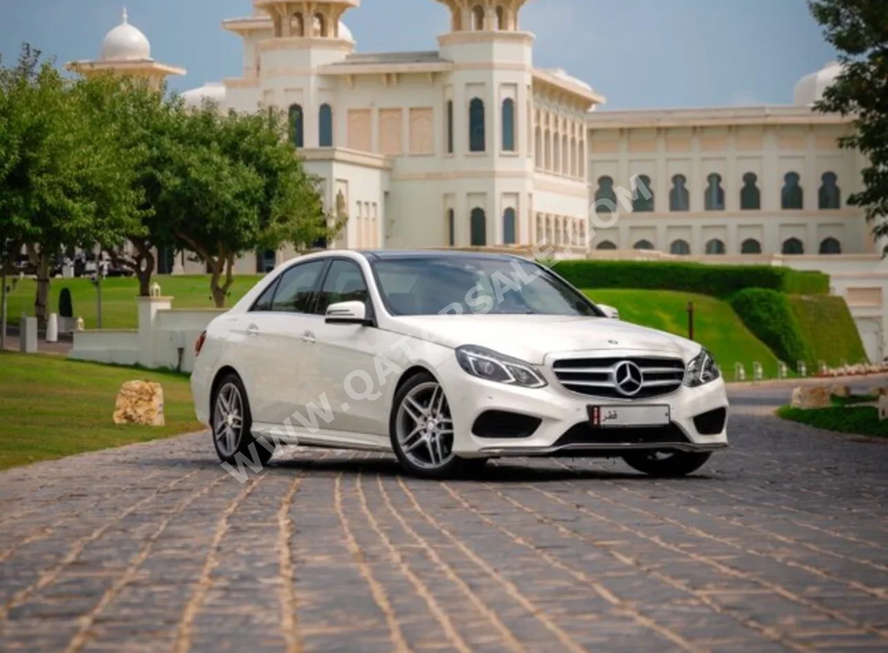 مرسيدس - بنز اي - كلاس 300 2014 اوتوماتيك 60,000 كم 6 سلندر دفع خلفي سيدان أبيض