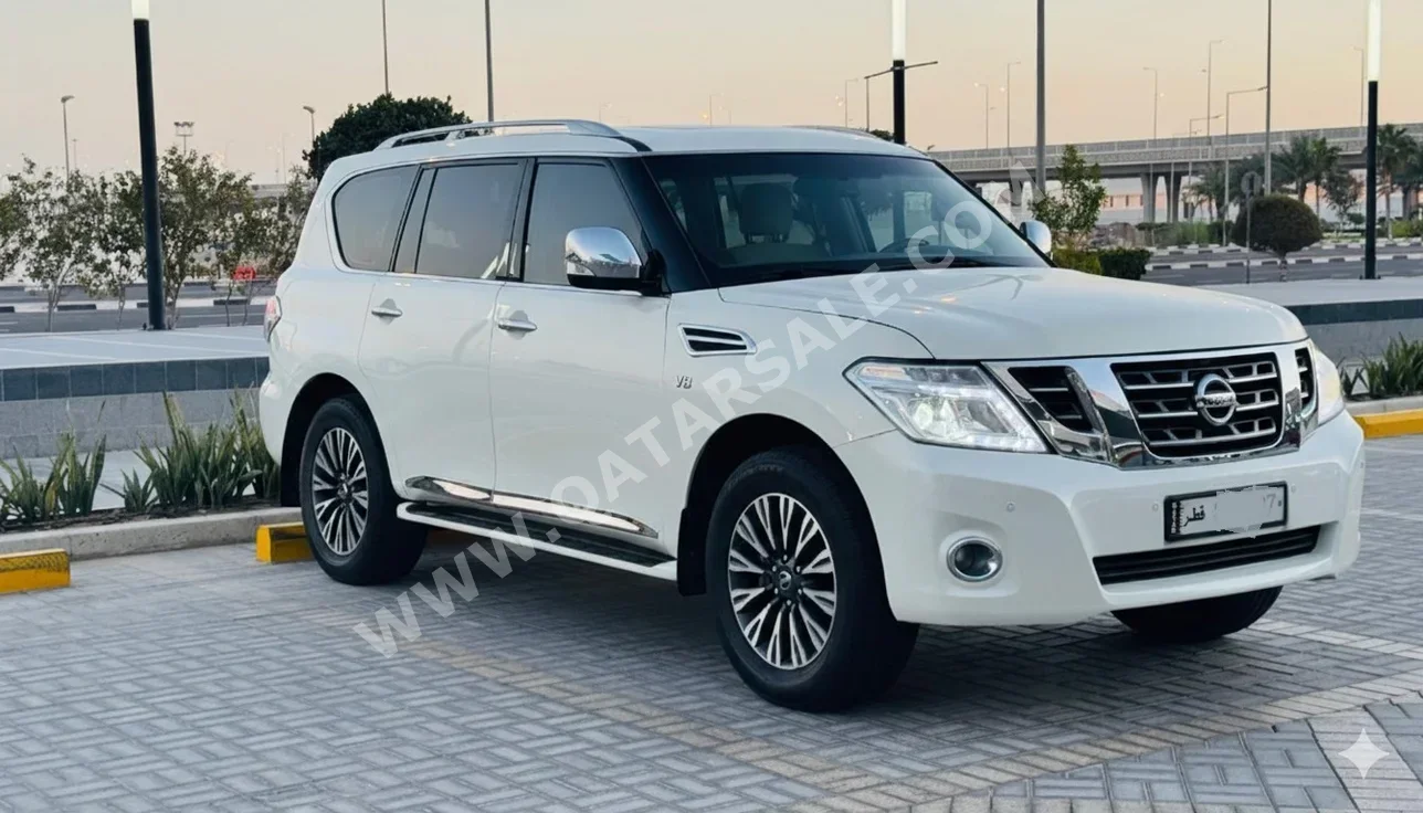 Nissan  Patrol  LE  2012  Automatic  240,000 Km  8 Cylinder  Four Wheel Drive (4WD)  SUV  White