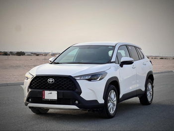 Toyota  Corolla  Cross Hybrid  2023  Automatic  34,000 Km  4 Cylinder  Four Wheel Drive (4WD)  SUV  White  With Warranty