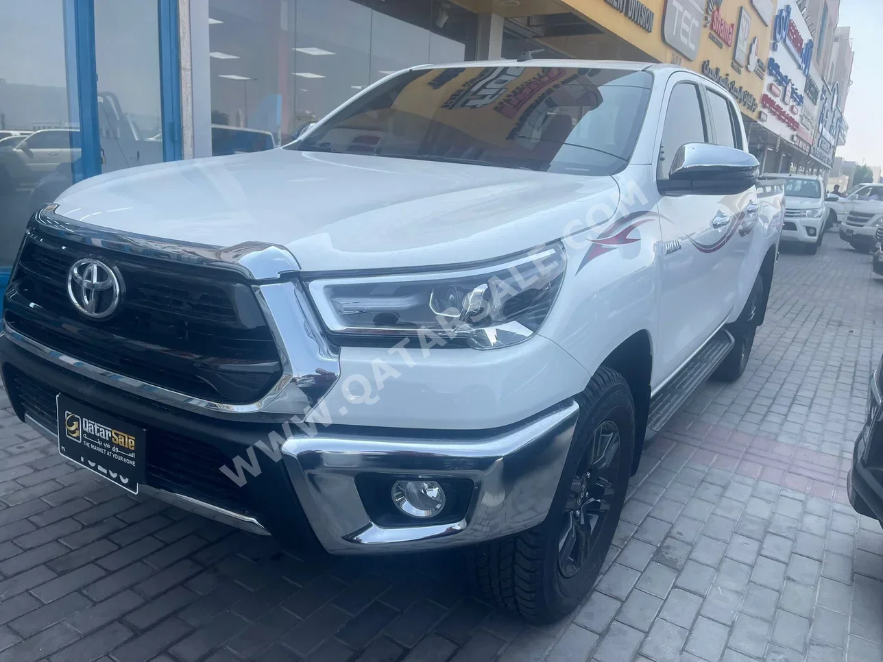 تويوتا هاي لوكس 2025 اوتوماتيك 168 كم 4 سلندر دفع رباعي بيكب أبيض