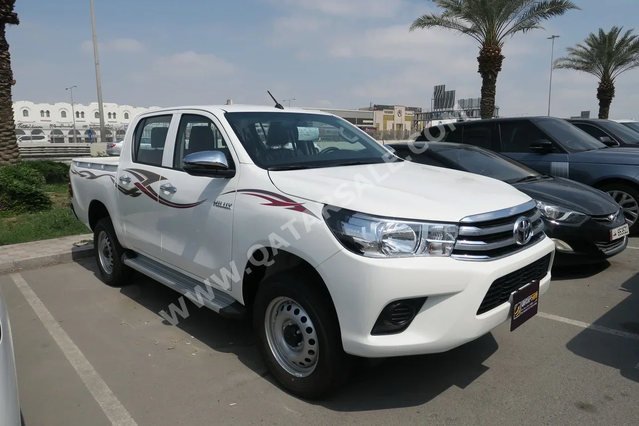 تويوتا هاي لوكس 2026 اوتوماتيك 0 كم 4 سلندر دفع رباعي بيكب أبيض تحت الضمان