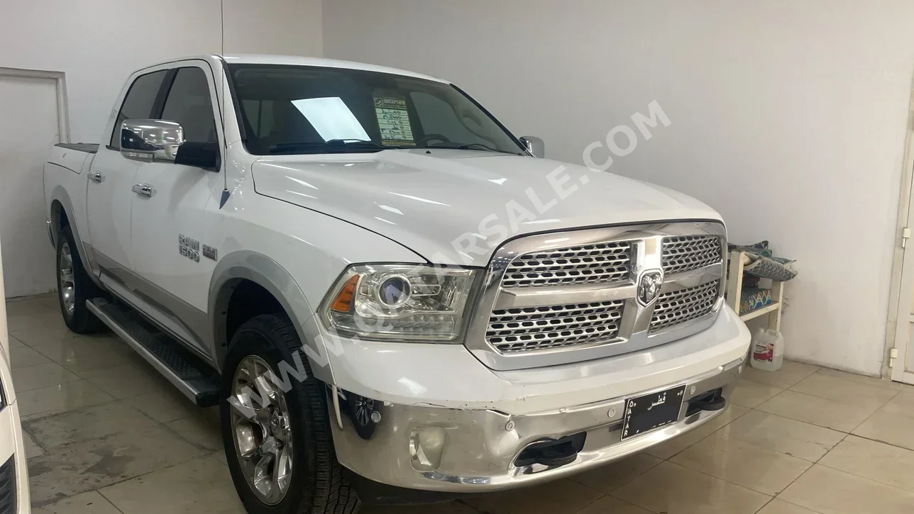 دودج  رام  1500  2014  اوتوماتيك  260,000 كم  8 سلندر  دفع رباعي  بيكب  أبيض