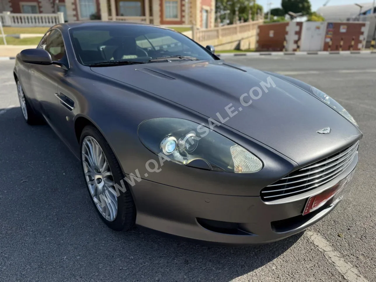 أستون مارتن دي بي 9 2009 اوتوماتيك 40,000 كم 12 سلندر دفع خلفي كوبيه \ سبورت رمادي