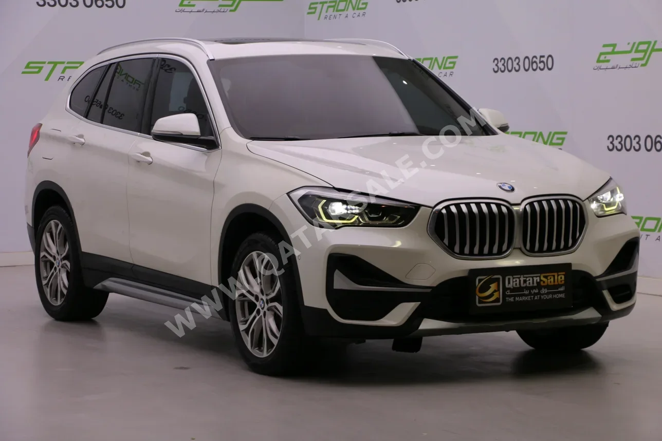 بي ام دبليو الفئة - اكس اكس 1 2020 اوتوماتيك 90,000 كم 4 سلندر دفع رباعي اس يو في أبيض