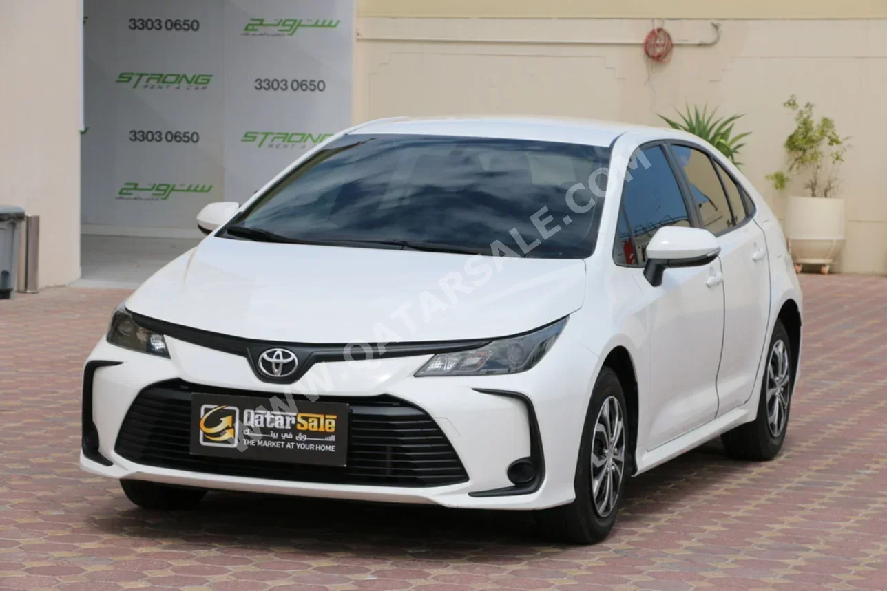 Toyota  Corolla  2024  Automatic  23,000 Km  4 Cylinder  Front Wheel Drive (FWD)  Sedan  White  With Warranty