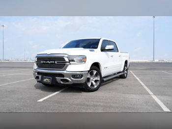 Dodge  Ram  1500 Laramie  2022  Automatic  25,000 Km  8 Cylinder  Four Wheel Drive (4WD)  Pick Up  White  With Warranty