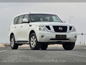 Nissan  Patrol  SE  2013  Automatic  295,000 Km  8 Cylinder  Four Wheel Drive (4WD)  SUV  White