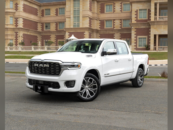 دودج  رام  تنكستين  2025  اوتوماتيك  0 كم  8 سلندر  دفع رباعي  بيكب  أبيض  تحت الضمان