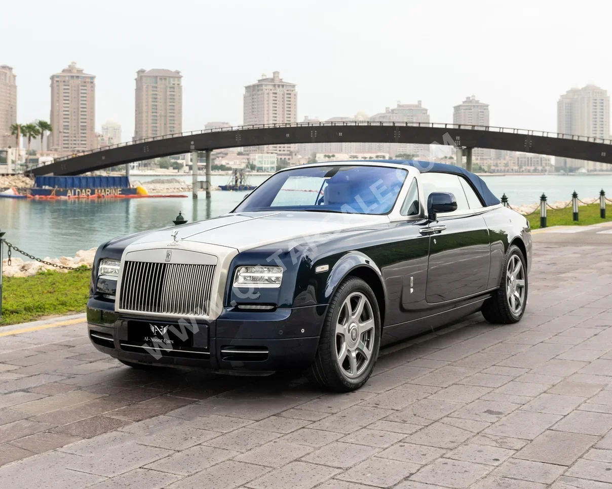 Rolls-Royce  Phantom  Drophead  2014  Automatic  11,000 Km  12 Cylinder  All Wheel Drive (AWD)  Convertible  Dark Blue