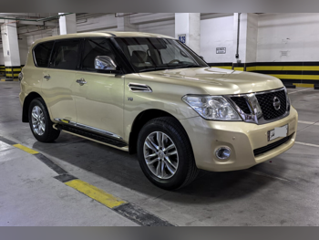 Nissan  Patrol  LE  2013  Automatic  273,000 Km  8 Cylinder  Four Wheel Drive (4WD)  SUV  Gold