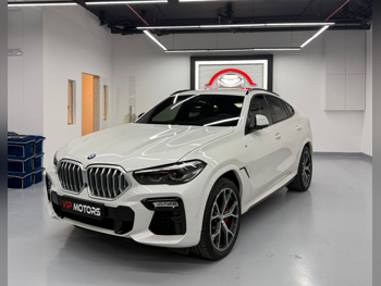 بي ام دبليو  الفئة - اكس  اكس 6  2022  اوتوماتيك  60,000 كم  6 سلندر  دفع رباعي  اس يو في  أبيض  تحت الضمان
