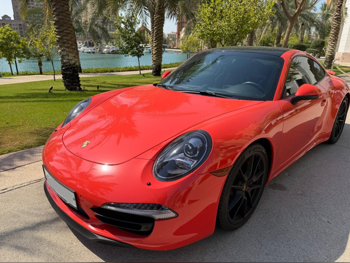 بورش 911 كاريرا 4 اس 2015 تبترونك 71,000 كم 6 سلندر دفع رباعي كوبيه \ سبورت برتقالي