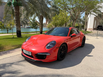 بورش  911  كاريرا 4 اس  2015  تبترونك  71,000 كم  6 سلندر  دفع رباعي  كوبيه \ سبورت  برتقالي