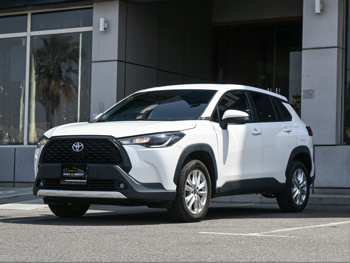 Toyota  Corolla  Cross Hybrid  2022  Automatic  177,000 Km  4 Cylinder  Front Wheel Drive (FWD)  SUV  White