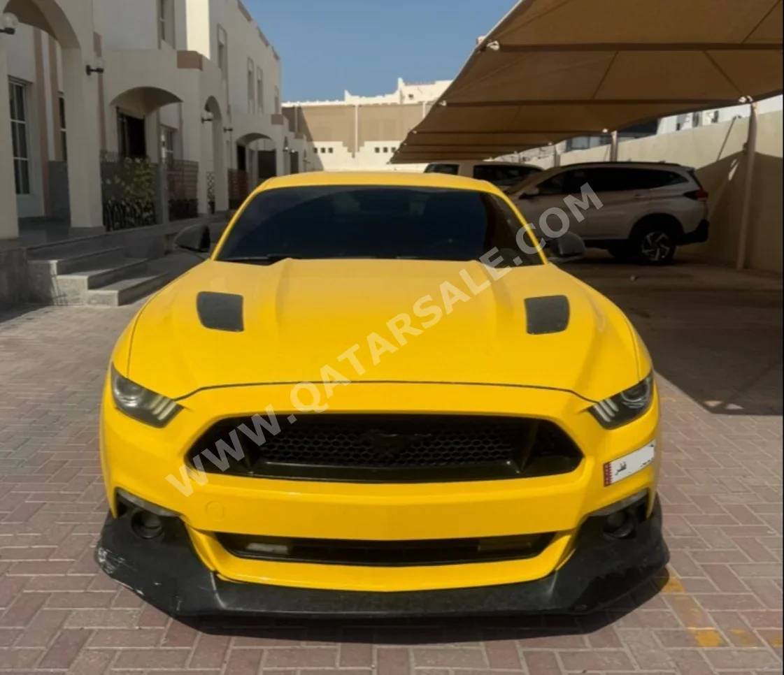 Ford  Mustang  GT  2015  Automatic  184,000 Km  8 Cylinder  Rear Wheel Drive (RWD)  Coupe / Sport  Yellow