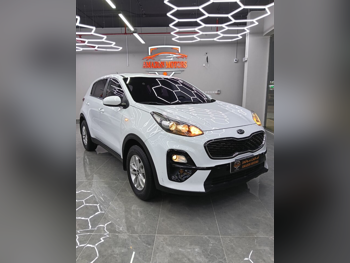 Kia  Sportage  2.0  2019  Automatic  80,000 Km  4 Cylinder  Front Wheel Drive (FWD)  SUV  White