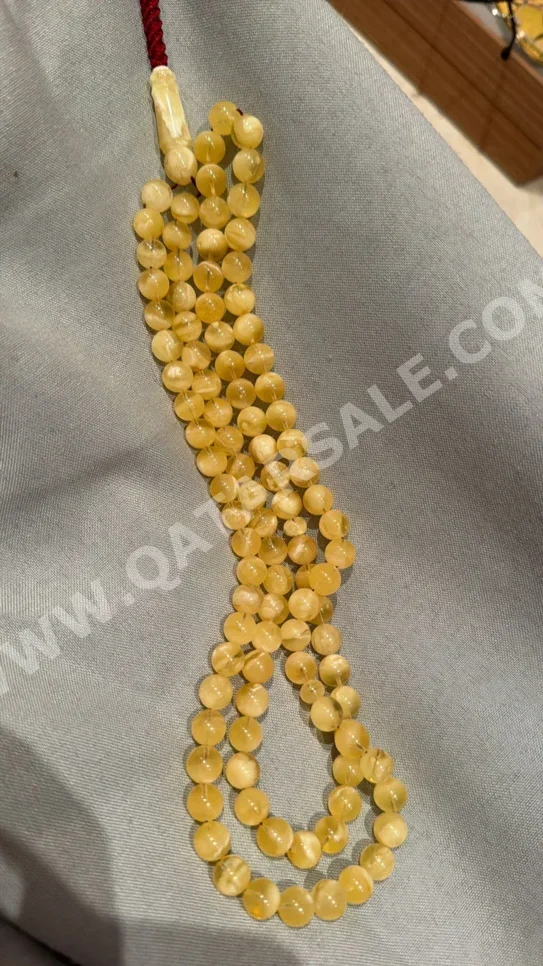 مسبحة كهرمان  أبيض لؤلؤي  40 غرام  البيضاوي / الدائرة  8 ملي