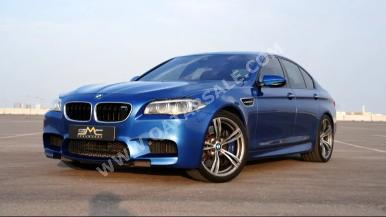 بي ام دبليو  الفئة - ام  5  2014  اوتوماتيك  90,000 كم  8 سلندر  دفع خلفي  سيدان  ازرق