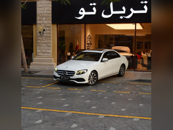 Mercedes-Benz  E-Class  200  2019  Automatic  119,700 Km  4 Cylinder  Rear Wheel Drive (RWD)  Sedan  White