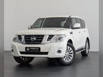 Nissan  Patrol  Titanium  2018  Automatic  96,480 Km  8 Cylinder  Four Wheel Drive (4WD)  SUV  White